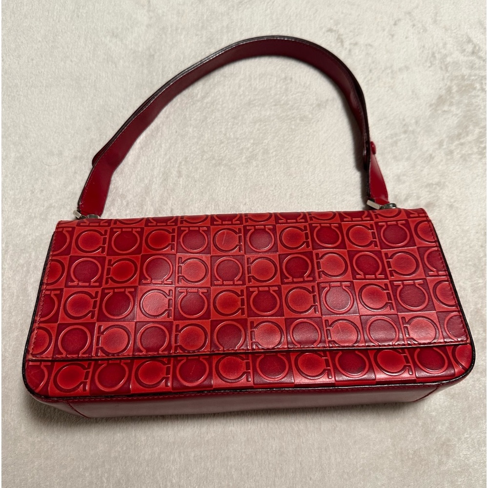 Salvador Ferragamo red patterned leather shoulder bag with adjustable straps